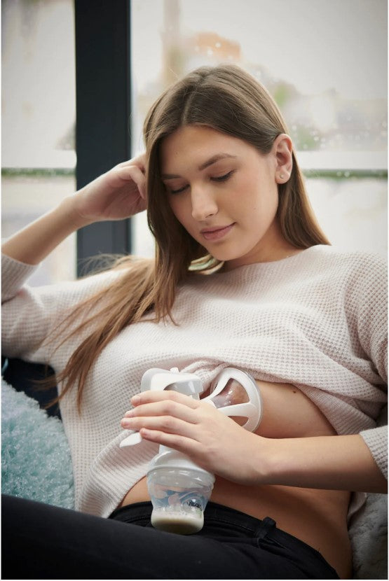 Pompă manuală Flexzone + 6 tampoane Vital Baby