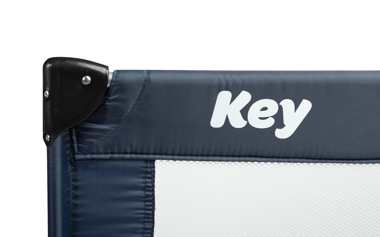 Folding travel cot Key Navy Caretero