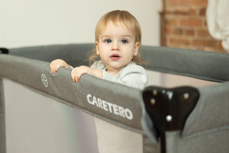 Folding playpen with drop side Esti Grey Caretero